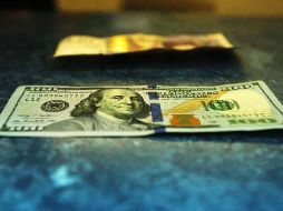 El Banco BASE prevé que el tipo de cambio cotice entre 18.90 y 19.20 pesos por dólar en cotizaciones interbancarias a la venta. EL INFORMADOR /ARCHIVO