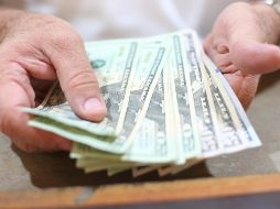 El banco BASE prevé que el tipo de cambio cotice entre 18.85 y 19.10 pesos por dólar en cotizaciones interbancarias a la venta. EL INFORMADOR / ARCHIVO