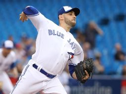 Marco Estrada trabajó por espacio de cinco entradas y un tercio, permitió siete imparables y tres carreras. AFP/T. Szczerbowski