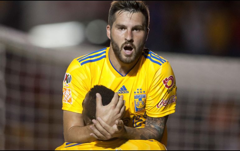 André-Pierre Gignac llegó a cinco tantos y tomó la punta de la tabla de goleo individual. AFP/J. Aguilar