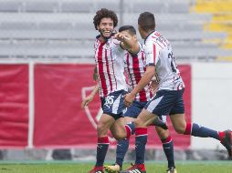 César Huerta celebra el gol que le daba al Rebaño el empate 1-1 al 64'. MEXSPORT/C. de Marchena