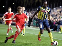 ''Necesitaré meses, cuatro o cinco meses para sentirme cómodo en el equipo, para acostumbrarme al control del balón tras los pases, al juego de mis compañeros'', apuntó el ex campeón mundial del atletismo. EFE / D. Himbrechts