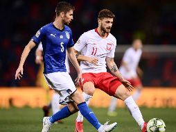 Jorginho (I) anotó de penalti el único gol de Italia. AFP/M. Bertorello