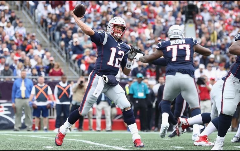 La dupla estelar del ataque de los Pats, funcionó en siete jugadas distintas, incluidas tres para un avance de 21 yardas hasta la zona prometida. AFP / M. Meyer