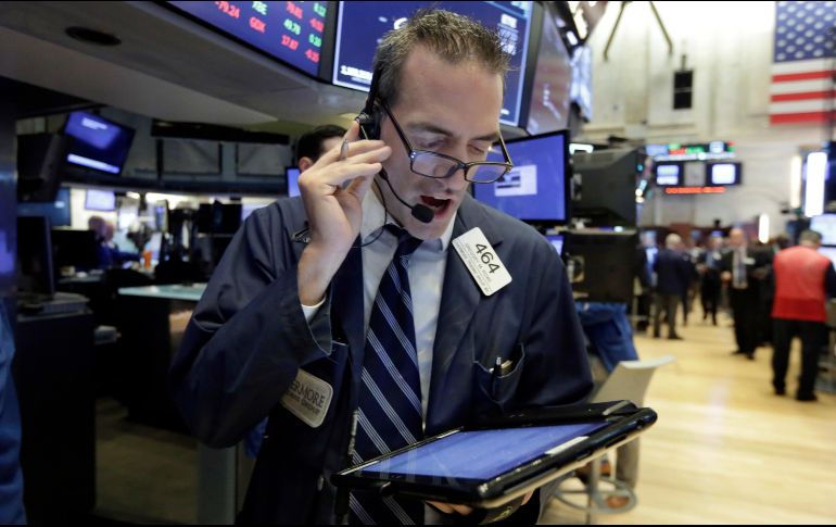 El NYSE Composite, por su parte, gana 15.24 puntos (0.12 por ciento) al ubicarse en 12 mil 967.54 unidades. AP / ARCHIVO