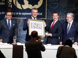 Enrique Peña Nieto durante su participación en la Reunión Anual de Industriales. Lo acompañan Ildefonso Guajardo, secretario de Economía (izq.); y Francisco Cervantes (2do de izq. a der.), presidente de la Concamin. SUN/A. Salinas