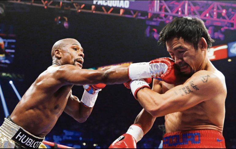 Floyd Mayweather Jr. y Manny Pacquiao se enfrentaron en 2015, con una clara victoria para el estadounidense. AP