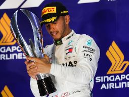 Hamilton, cuatro veces monarca de la F1, conquistó su séptima carrera de la temporada. AP / V. Thian