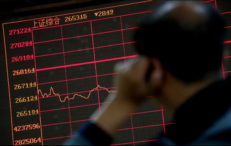 Los planes de Trump de avanzar su batalla comercial con China prácticamente paralizaron a los inversores en Wall Street. AP/ A. Wong