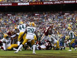 Adrian Peterson corrió para 120 yardas y anotó dos veces. AFP / T. Olszewski