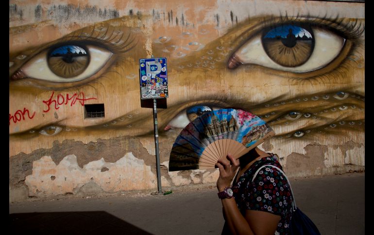 Murales del artista británico My Dog Sighs se ven en la zona Trastevere de Roma, Italia. AP/A. Tarantino