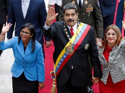Delcy rodríguez, vicepresidenta de Venezuela, Nicolás Maduro y su esposa Cilia Flores. AP/A. Cubilos.