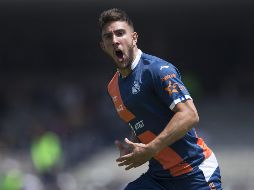 Cavallini celebra el primer gol del Puebla al minuto 58. MEXSPORT/J. Ramírez