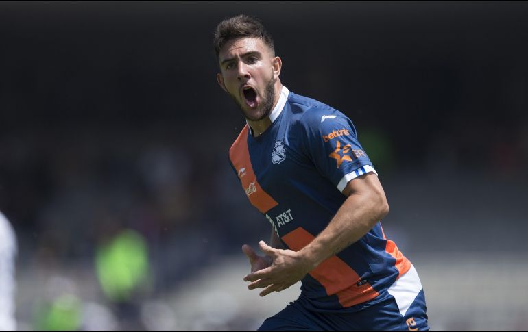 Cavallini celebra el primer gol del Puebla al minuto 58. MEXSPORT/J. Ramírez