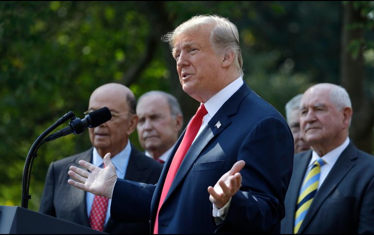 La noche del domingo, Canadá aceptó firmar el acuerdo trilateral entre México y Estados Unidos. AP/ E. Vucci