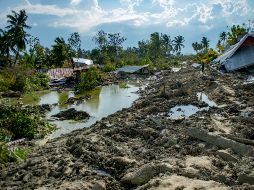 En Petobo vivían cerca de 500 personas y por el momento se han rescatado los restos de catorce pobladores, mientras las tareas de búsqueda continúan. AFP / B. Ismoyo