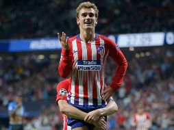 Griezmann se convirtió ayer, con su segundo tanto, en el autor del gol número ocho mil de la historia de la Liga de Campeones. AP / P. White