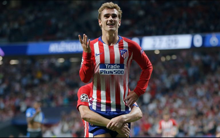 Griezmann se convirtió ayer, con su segundo tanto, en el autor del gol número ocho mil de la historia de la Liga de Campeones. AP / P. White