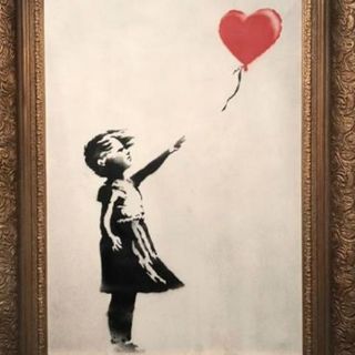 Obra de Banksy se autodestruye en una subasta