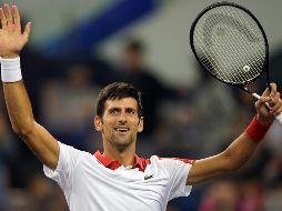 Djokovic cumplió con sus expectativas y venció este martes a un combativo Jeremy Chardy para alcanzar los octavos de final al doblegar al francés por 6-3 y 7-5. AFP / J. Eisele