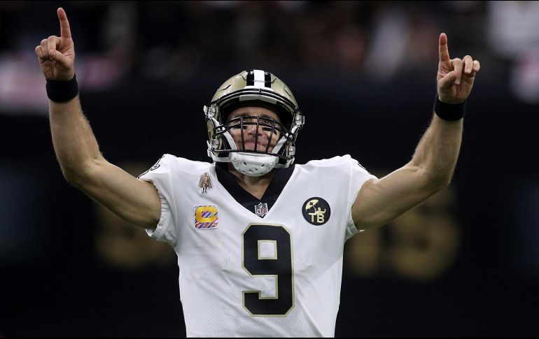 Brees consiguió 363 yardas y tres pases de anotación en la victoria sobre los Pieles Rojas de Washington, además de convertirse en el mariscal con más yardas en la historia de la NFL. AFP / C. Graythen