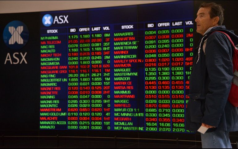 Al término de la jornada accionaria, en la plaza bursátil local se operó un volumen de 298.9 millones de títulos. AFP/P. Parks