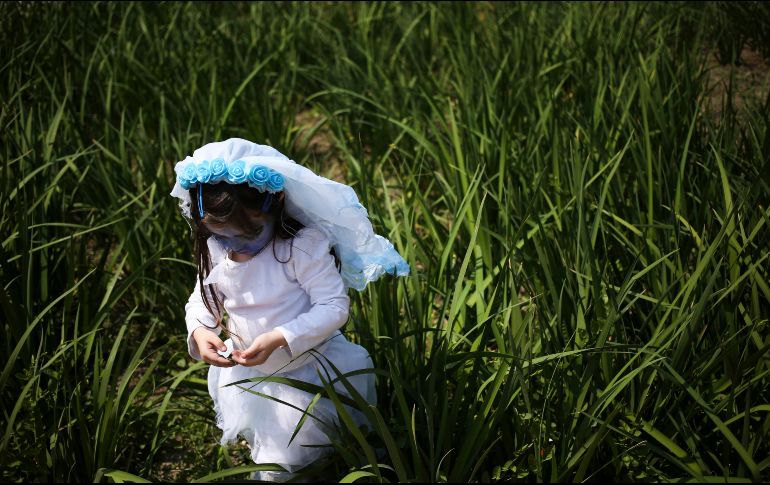 Los zombis usaron trajes complicados y caras totalmente desfiguradas, cabellos de todos los colores, calaveras personificadas y hasta candados en la nariz. AP/E. Felix