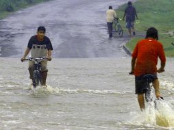 Las lluvias han afectados a 41 de los 153 municipios del país, y a 13 de los 15 departamentos. AFP