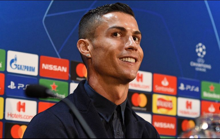 ''No deseo hablar de otros equipos (…) No depende de mí hablar del problema de otros'', apuntó el luso, ''juego en un gran equipo y tengo una gran familia''. AFP / O. Scarf