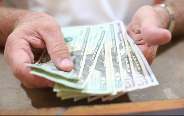 Durante la sesión se espera que el tipo de cambio cotice entre 19.48 y 19.70 pesos por dólar en cotizaciones interbancarias a la venta. EL INFORMADOR / ARCHIVO