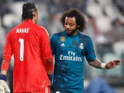 Marcelo (D) se perdería al menos cuatro partidos con los merengues. AFP/ARCHIVO