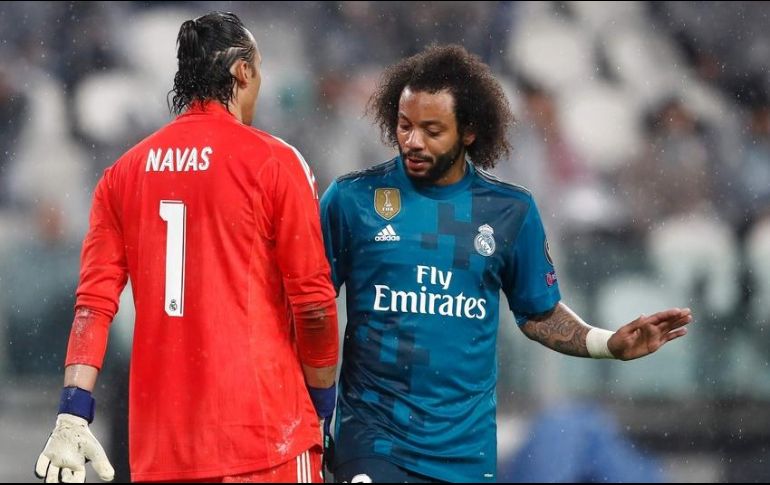 Marcelo (D) se perdería al menos cuatro partidos con los merengues. AFP/ARCHIVO