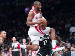 Chris Paul encabezó la ofensiva de los Rockets al aportar 32 puntos ayer ante los Nets. AP/M. Altaffer