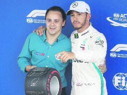 Felipe Massa (izq.) reconoció el esfuerzo que hizo ayer Lewis Hamilton, quien se quedó con la posición de privilegio del Gran Premio de Brasil. AP / A. Penner