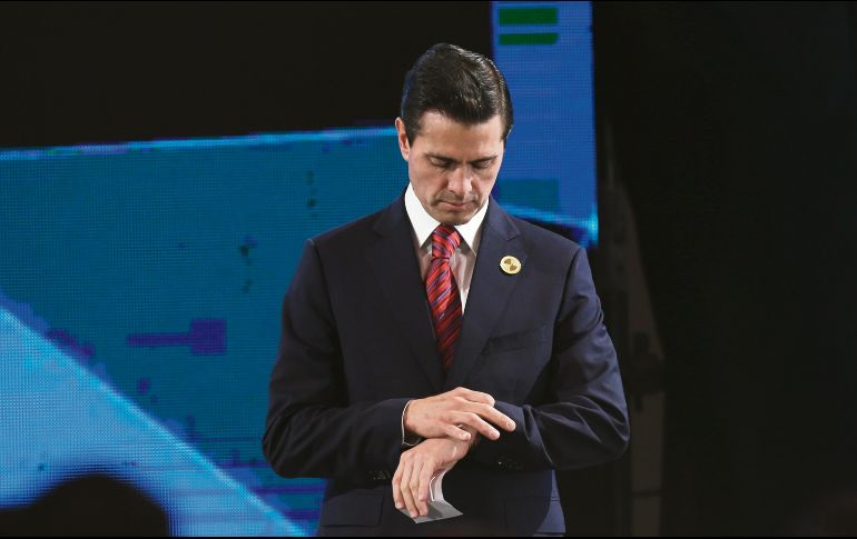 Enrique Peña, en su llegada al Encuentro Empresarial en Antigua, Guatemala. AP