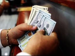 El Banco BASE prevé que el tipo de cambio cotice entre 20.20 y 20.50 pesos por dólar en cotizaciones interbancarias a la venta. EL INFORMADOR / ARCHIVO