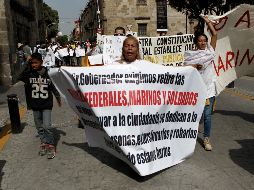 Varios de los asistentes utilizaban pasamontañas o se cubrían el rostro con sus chamarras y cubrebocas. EL INFORMADOR/F. Atilano