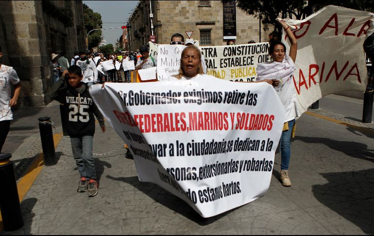 Varios de los asistentes utilizaban pasamontañas o se cubrían el rostro con sus chamarras y cubrebocas. EL INFORMADOR/F. Atilano