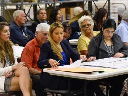 La ley estatal requiere un recuento manual cuando el margen de victoria es de 0.25 puntos porcentuales o menos. AFP/M. Sandberg