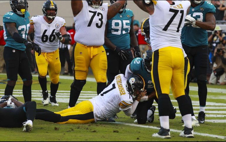 Con cinco segundo por jugar, Ben Roethlisberger anotó por tierra para darle la vuelta al marcador. AFP/S. Halleran
