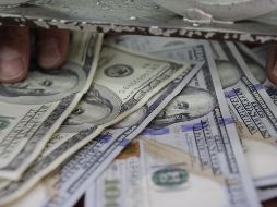 El tipo de cambio para solventar operaciones denominadas en moneda extranjera en el país se ubica en 20.4123 pesos. EL INFORMADOR / ARCHIVO