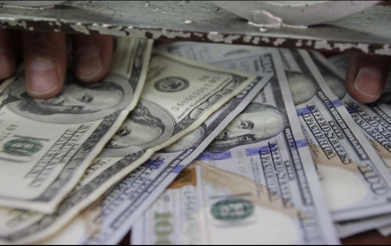 El tipo de cambio para solventar operaciones denominadas en moneda extranjera en el país se ubica en 20.4123 pesos. EL INFORMADOR / ARCHIVO