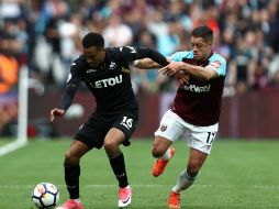 El técnico afirma que observará el rendimiento de Hernández (D) 