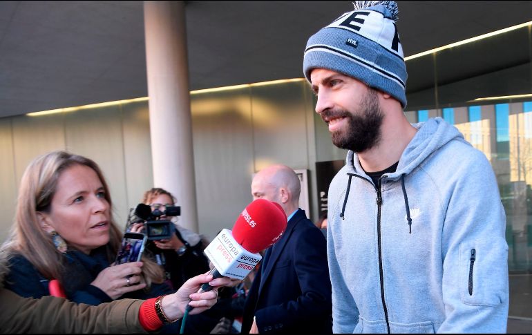 Piqué ha llegado puntual a la cita y ha abandonado los juzgados quince minutos después, sin querer hacer declaraciones. AFP / L. Gene