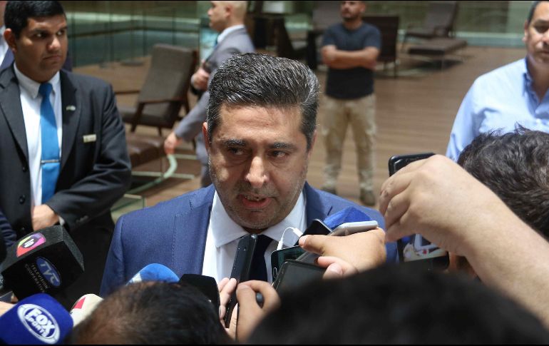 Angelici se reunió hoy con los presidentes de Conmebol y de Boca en Asunción, Paraguay. EFE/A. Cristaldo