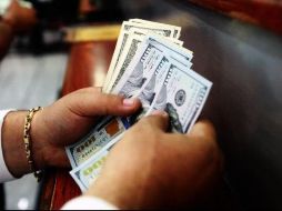 El billete verde se compró en un precio mínimo de 19.30 pesos. EL INFORMADOR / ARCHIVO