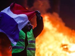  El gobierno desplegó entre cuatro mil y cinco mil agentes de la policía para tratar de evitar los incidentes, pero no tuvieron éxito. EFE/ E. Laurent