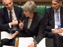 May trata estos días de recabar apoyos para el documento ante la posibilidad de que sea rechazado la próxima semana. AFP / ARCHIVO