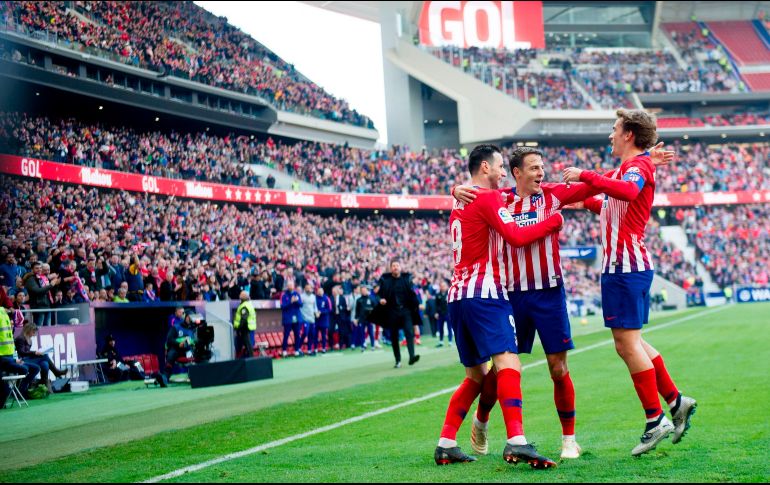 Nikola Kalinic ('25), Antoine Griezmann ('82) y Rodrigo ('88) marcaron los goles de los colchoneros. AFP / C. De la Torre