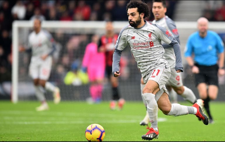 Las anotaciones de Salah caen en los minutos 23, 48 y 68 de tiempo corrido, mientras que el último tanto fue un autogol de Steve Cook en el minuto 77. AFP / G. Kirk